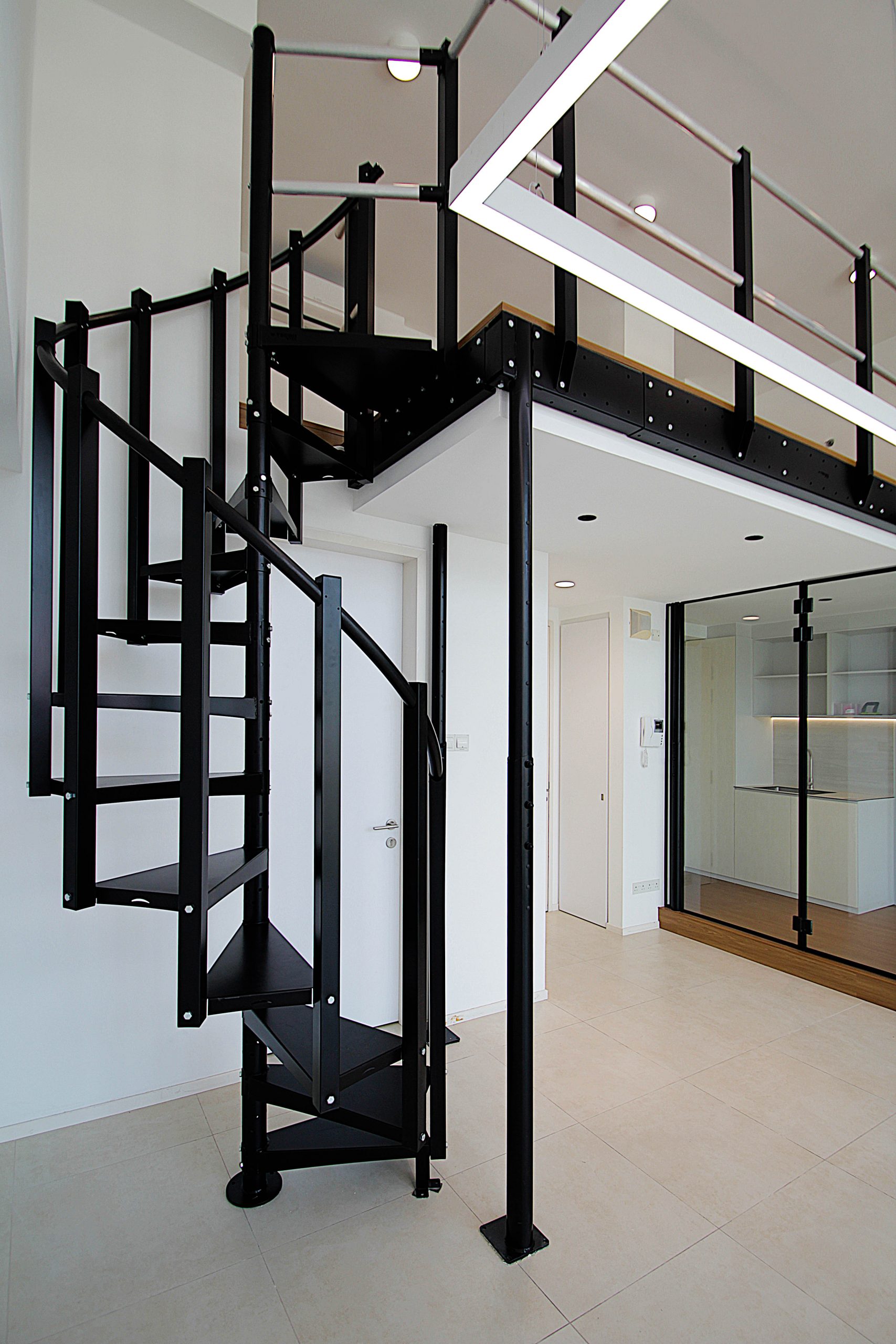 Utilizing the tall ceiling commercial space creating an additional mezzanine space for the extra storage.