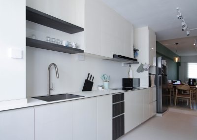 •Retro theme design •Open concept Kitchen •Vintage terrazzo flooring •Long Kitchen cabinet •Impact and stain resistant Kitchen worktop and backsplash •Back splash •Removable sink cover •Track lights creating a warm ambience •Cosy Living space