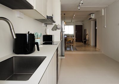 •Retro theme design •Open concept Kitchen •Vintage terrazzo flooring •Long Kitchen cabinet •Impact and stain resistant Kitchen worktop and backsplash •Back splash •Removable sink cover •Track lights creating a warm ambience •Cosy Living space